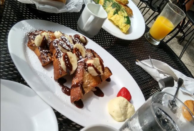 Chocolate banana French toast on a brunch table
